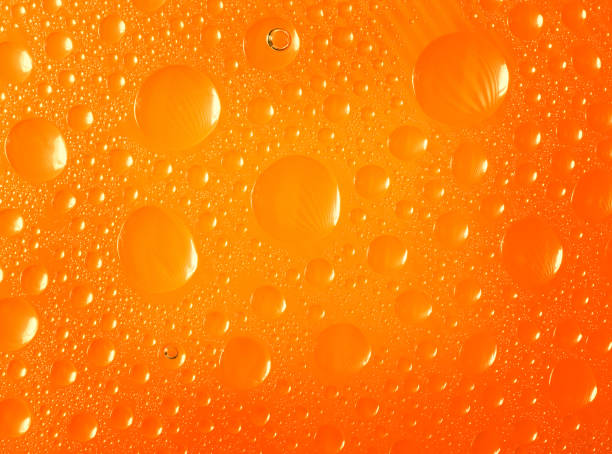 istock yellow water drops background.close up o 1432622678