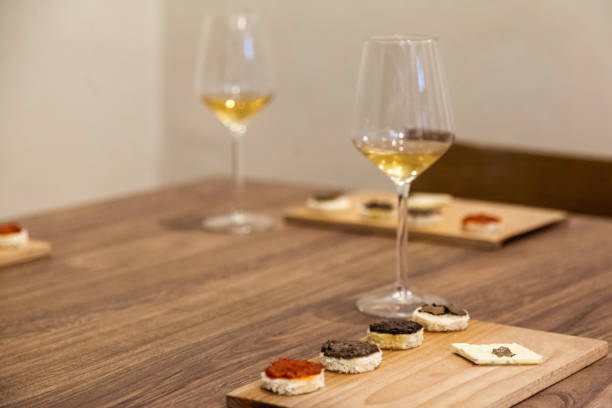 istock Table decoration with white and black Truffles and white wine. 1432625458