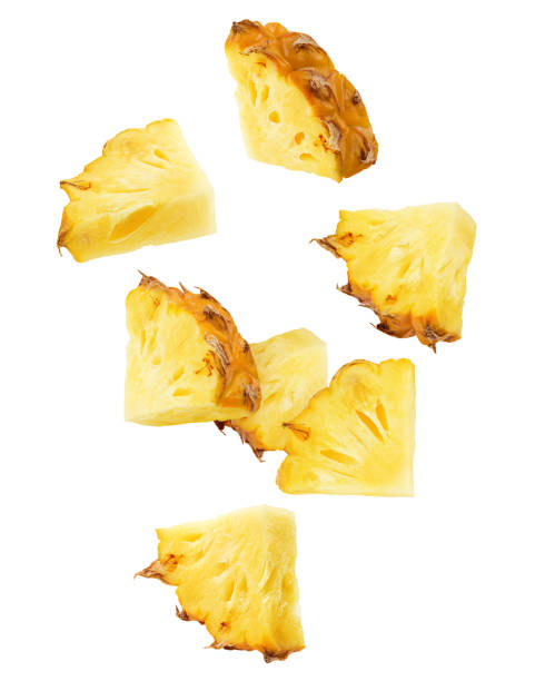 falling pineapple slice isolated on white background, clipping path, full depth of field - parte de imagens e fotografias de stock