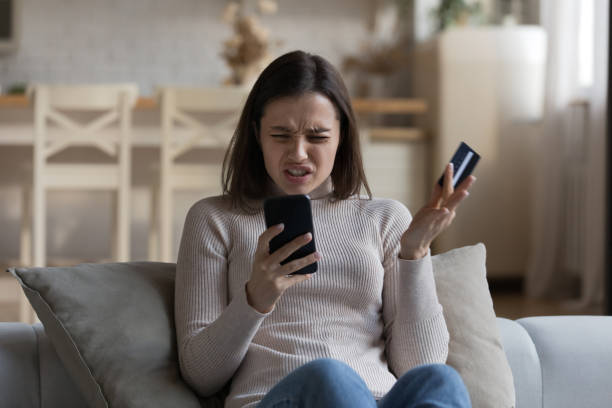 istock Nervous confused bank customer woman facing problems with online payments 1432634217