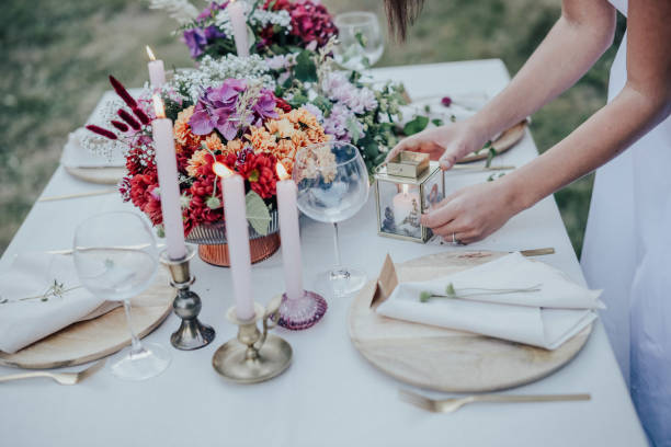 istock Modern wedding table decorated with plates, cutlery and flowers 1432634328