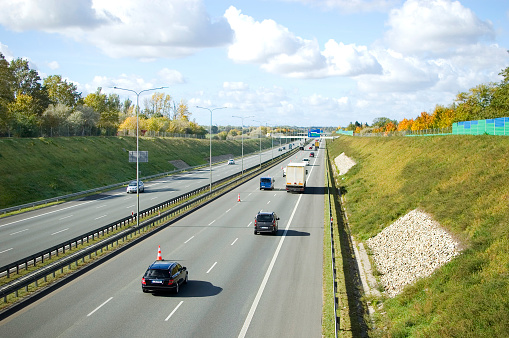 Poznan, Poland - October 9th 2022 - Polish A2 motorway with cars and trucks.