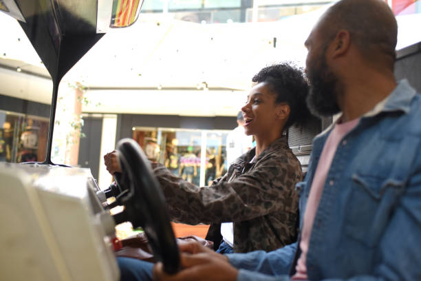 istock couple having fun in the mall 1432636293