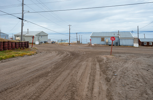 Streetscape of houses overlooking the Arctic Ocean at Pond Inlet (Mittimatalik), Nunavut