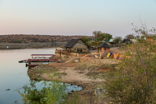 Oanob Lake, Namibia - 28 September 2018: View of the Lake Oanob, an idyllic holiday resort with a lake and a dam near Rehoboth in the Kalahari desert.