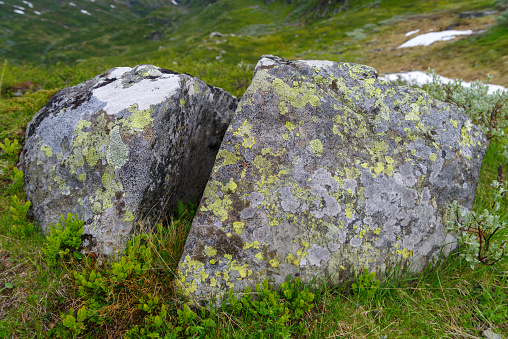 large boulder split in two along the R55, a national scenic road in Norway