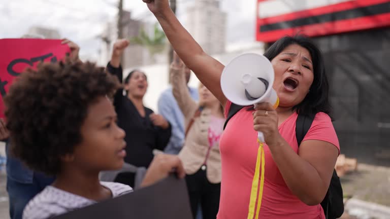 Group of people protesting in the streets