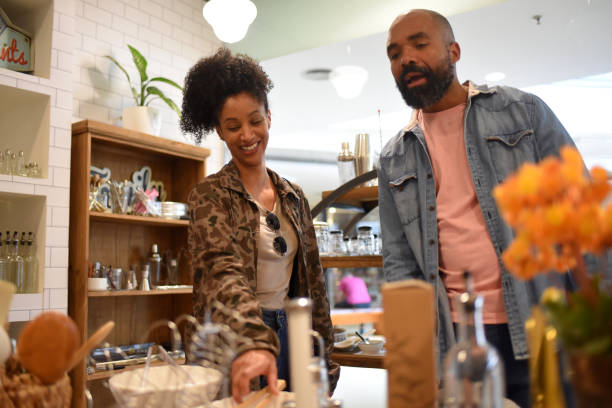 istock couple choosing kitchen utensils in mall store 1432648888