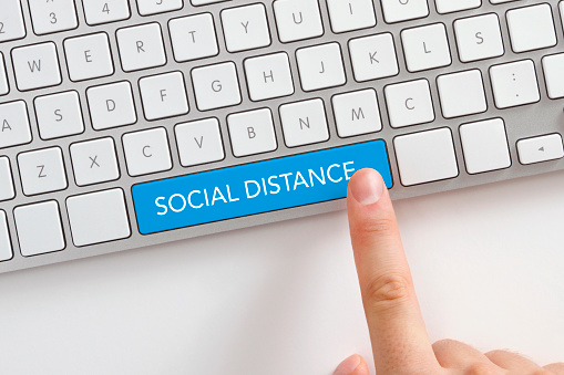 Social distance key on computer keyboard