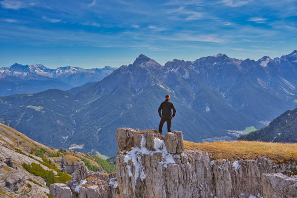 istock a hiker in front of the alps in Tyrol, Austria 1432649714