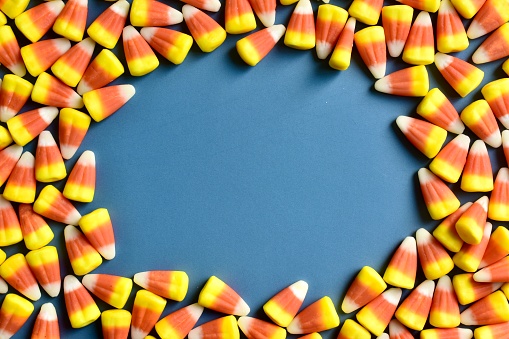 Candy corn on a blue background