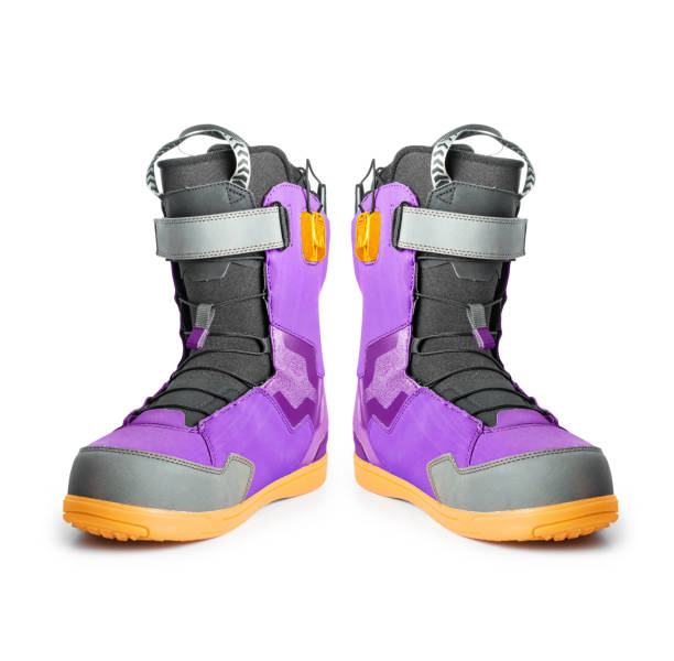 istock Two purple technological snowboard boots isolated on a white background 1432658507