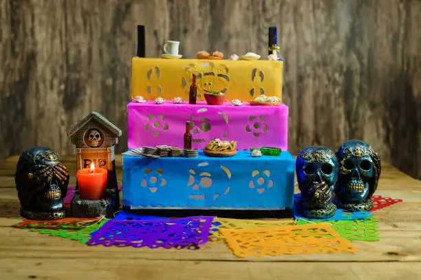 Miniature altar of the dead with offerings for deceased family members. Offering on the occasion of the Day of the Dead.