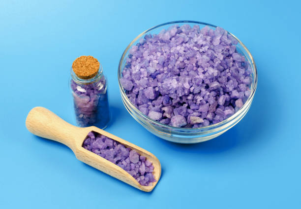 Bowl with lavender sea salt, selective focus. lavender purple salt