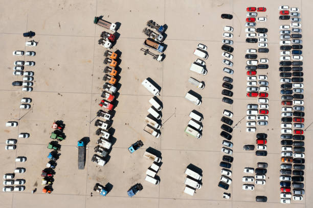 istock Large parking lot with cars, view from above 1432667722