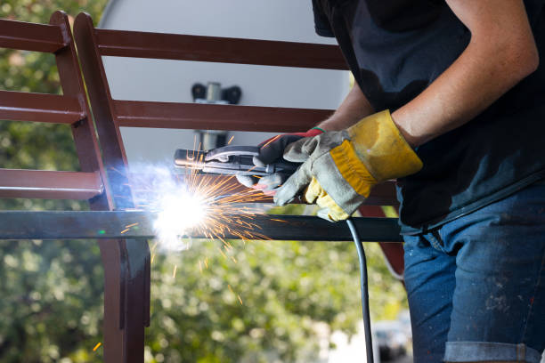 istock Welder welds metal by arc welding, welding of metal structures 1432667761
