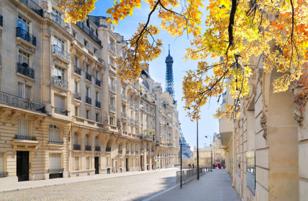 istock eiffel tour and Paris street 1432668032