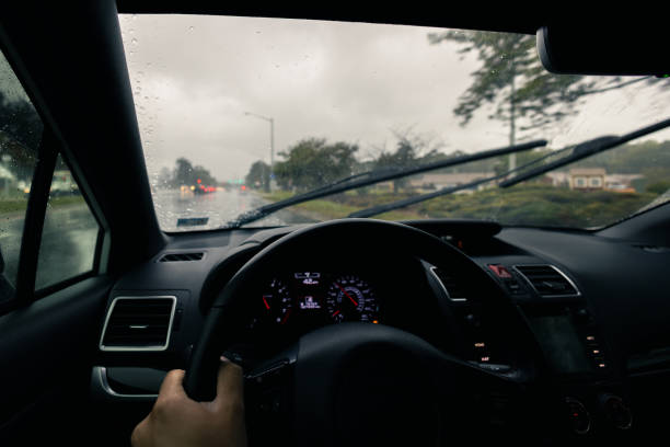 istock Inclement Weather Suburbs - Driving Through Intersection - Driving in the Rain 1432671862
