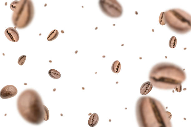 istock Coffee beans fall background. Black espresso coffee bean falling. Aromatic grain flying isolated on white. Concept for coffee product advertising. 1432672055