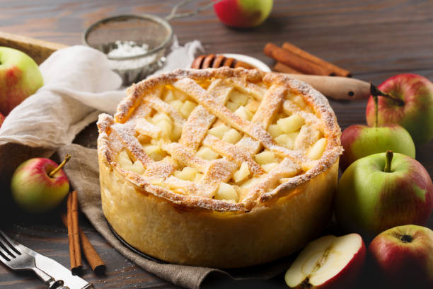istock Homemade Autumn Apple Pie on Dark Rustic Wooden Background 1432672288