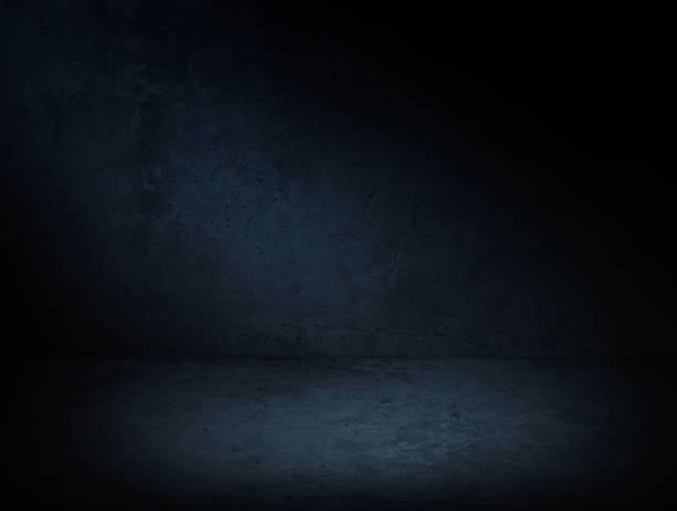 istock Dark blue concrete background with lighting. Urban empty  concrete room in the dark texture. Photography studio or product display backdrop for mock up. 1432684406