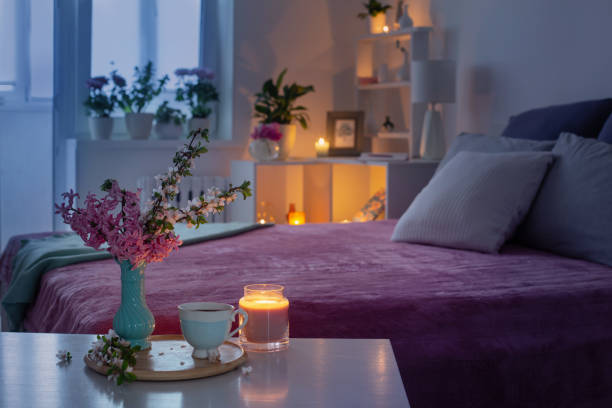 istock cozy bedroom in  evening with flowers and tea 1432685566
