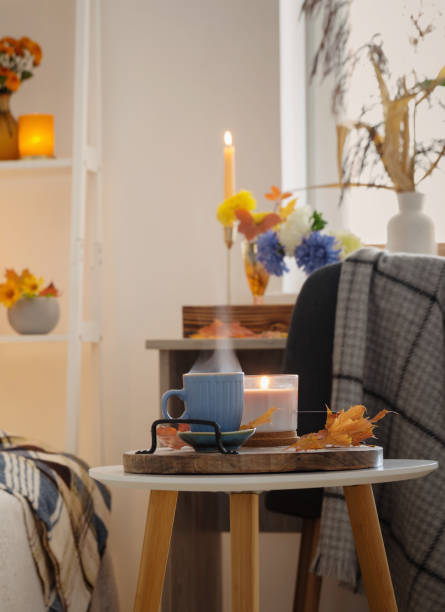 istock cup of coffee in cozy interior with autumnal decor 1432689046