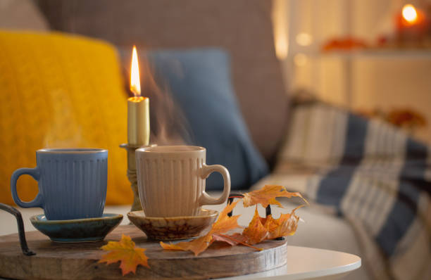 istock two  cups with hot drinks at home with autumnal decor 1432689055
