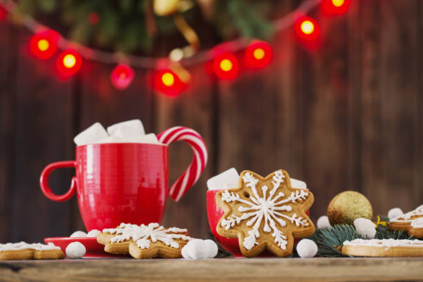 istock Christmas cookies on wooden table in kitchen 1432689076