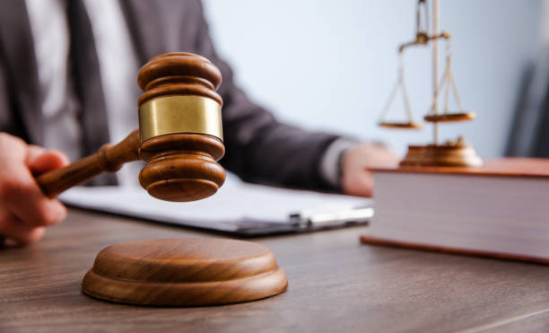 istock A man holds papers and hits the court. 1432689332