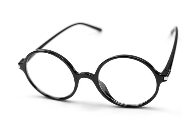 istock Stylish glasses for vision in a black round frame on a white background 1432694504