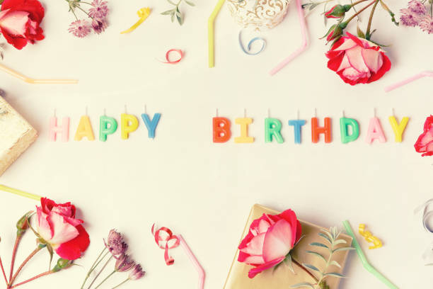istock Flat lay composition with gift boxes and roses on yellow background, space for text. Happy Birthday 1432694597