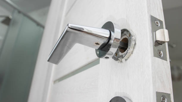 istock Broken doorknob in interior door. Poor quality door hardware, close-up 1432697232