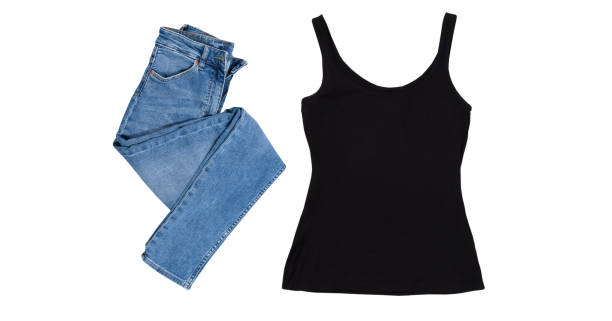 istock Black tank top and folded denim pants isolated on white background 1432698044
