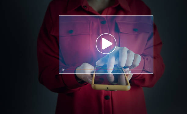 istock woman using a smartphone, watching video on the internet 1432698761