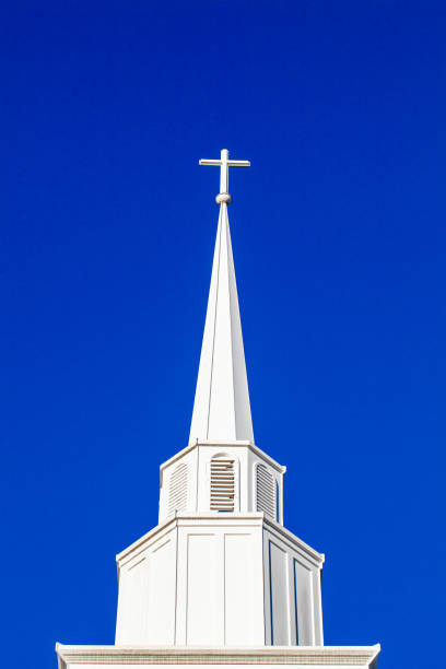 istock White cross on top of a steeple with copy space 1432704999