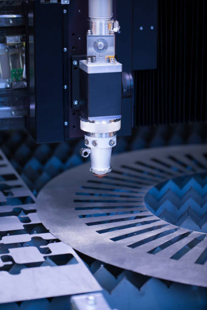 istock Cnc milling machine. Processing and laser cutting for metal in the industrial area with coolant. Industrial exhibition of machine tools. 1432705086
