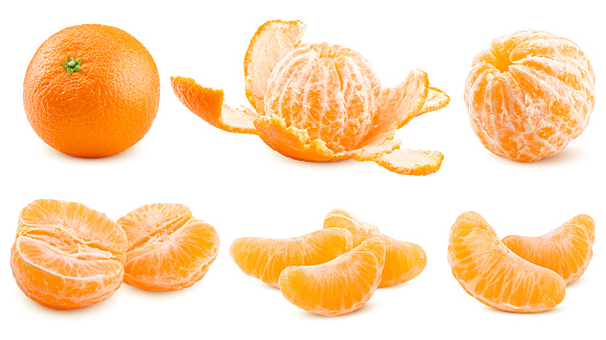 Tangerines group of citrus fruits closeup with leaves isolated on white background