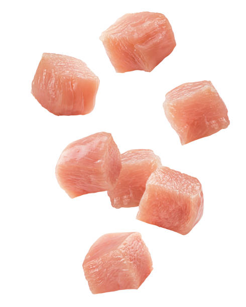 falling raw chicken, fillet, isolated on white background, clipping path, full depth of field - çiğ stok fotoğraflar ve resimler
