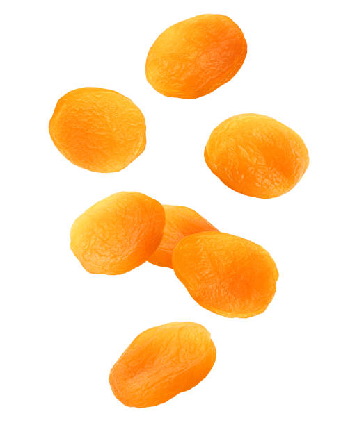 istock Falling Dried apricot isolated on white background, clipping path, full depth of field 1432705963