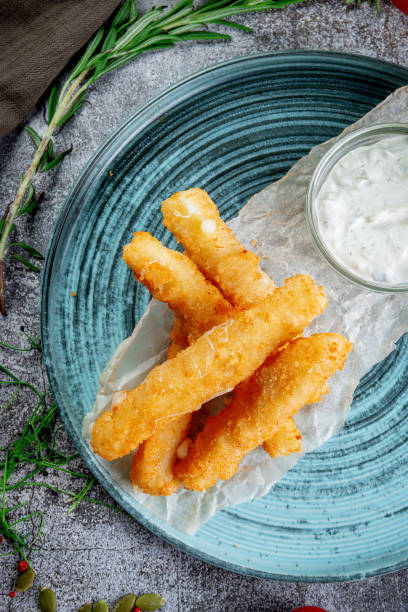 istock Beer snacks. Fried chicken and cheese nuggets. Fried mozzarella cheese sticks 1432710384
