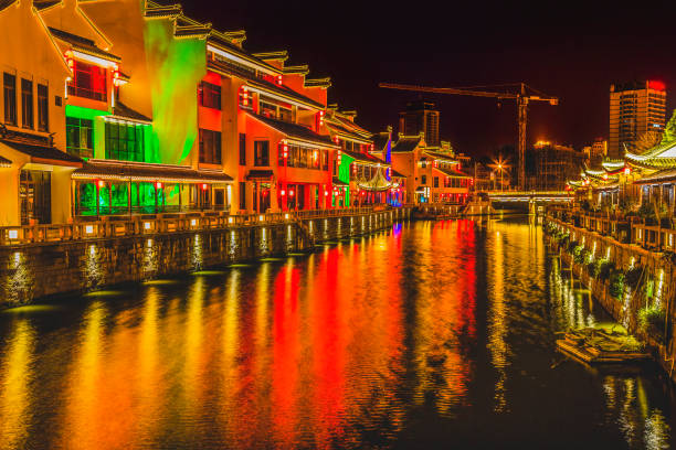 istock Water Canal Illuminated Night Wuxi Jiangsu China Night 1432715301