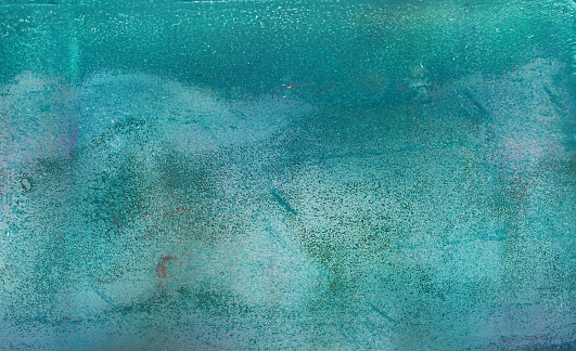 Textured background with shades of turquoise blue. Acrylic on paper.