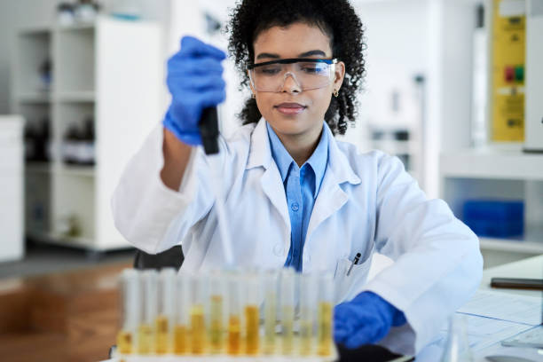 istock Medical, lab and vaccine research scientist with medicine analysis test in a lab. Study development, innovation and professional woman science expert working on new medical analytics in a laboratory 1432720113