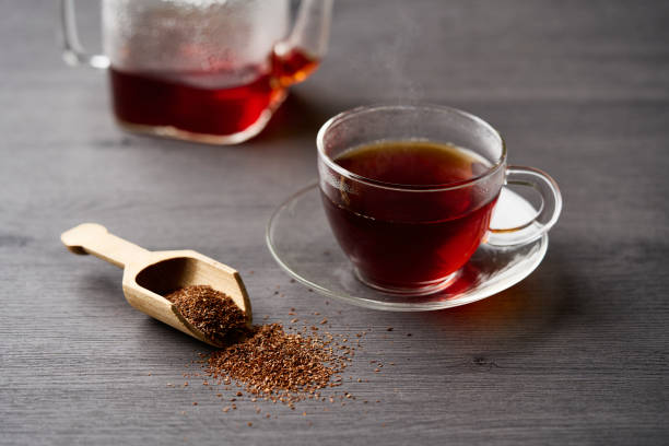 istock Hot rooibos tea in a cup and tea leaves. 1432721770