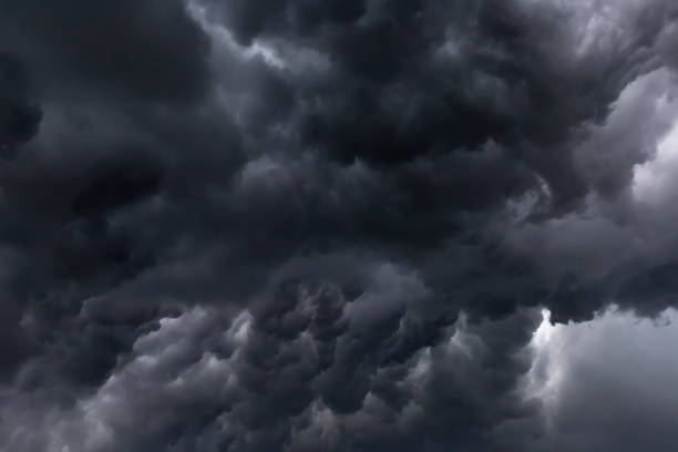 istock Dark storm cloud before the heavy dramatic thunder for weather and meteorology concept 1432724983