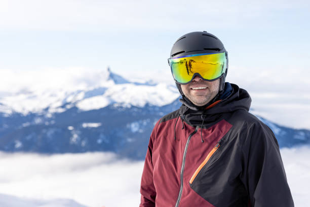 istock Man looking at Panorama at Whistler Blackcomb ski Resort, BC, Canada 1432727376