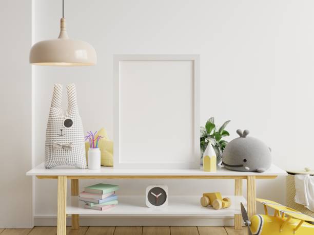 istock Mock up posters in child room interior, posters on empty white wall background. 1432732444