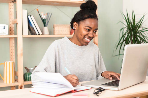 istock Portrait of a young Afro female freelancer 1432734945