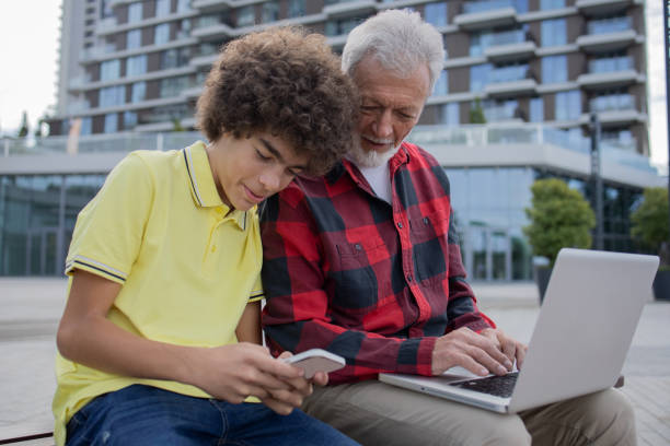 istock Grandfather and grandson spend time together 1432736175